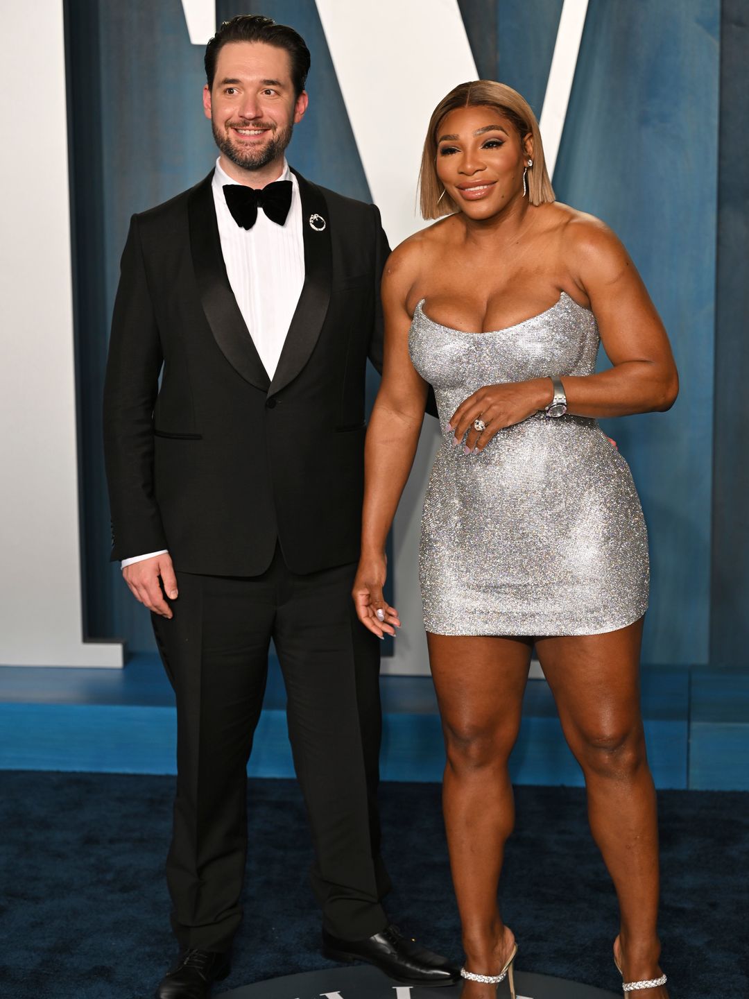Serena Williams and Alexis Ohanian smiling at the Oscars afterparty in 2022