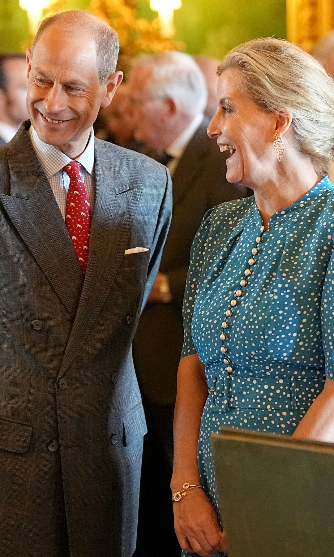 Prince Edwaes and the Duchess of Edinburgh chatting to a woman