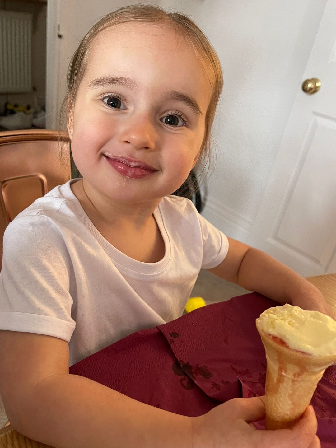 Ella Jordan eats an ice cream