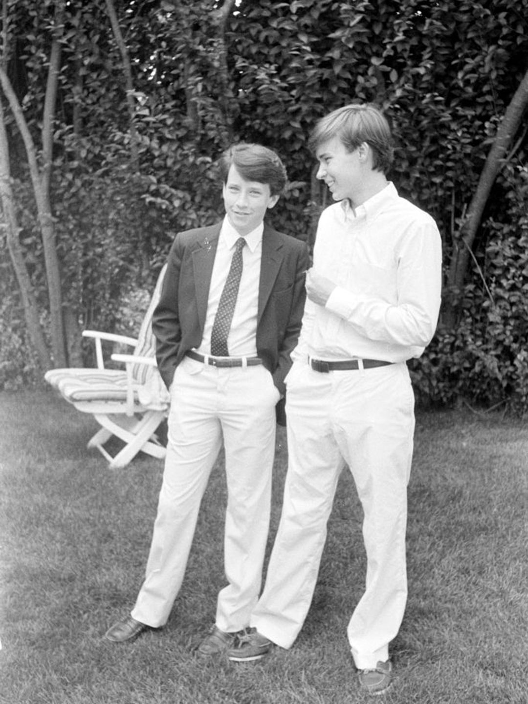 Anderson and Carter Cooper standing in a garden