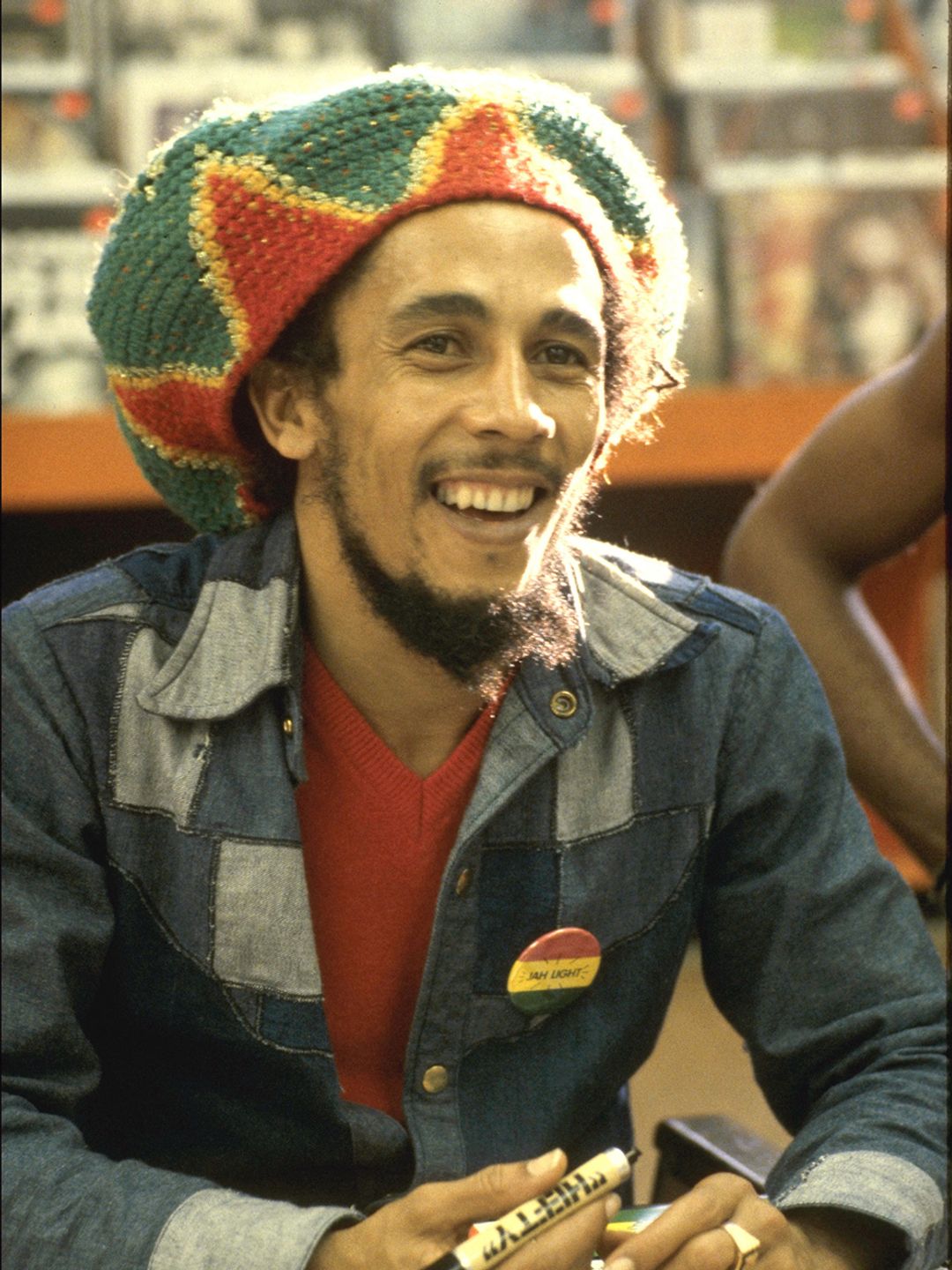 Bob Marley signing autographs