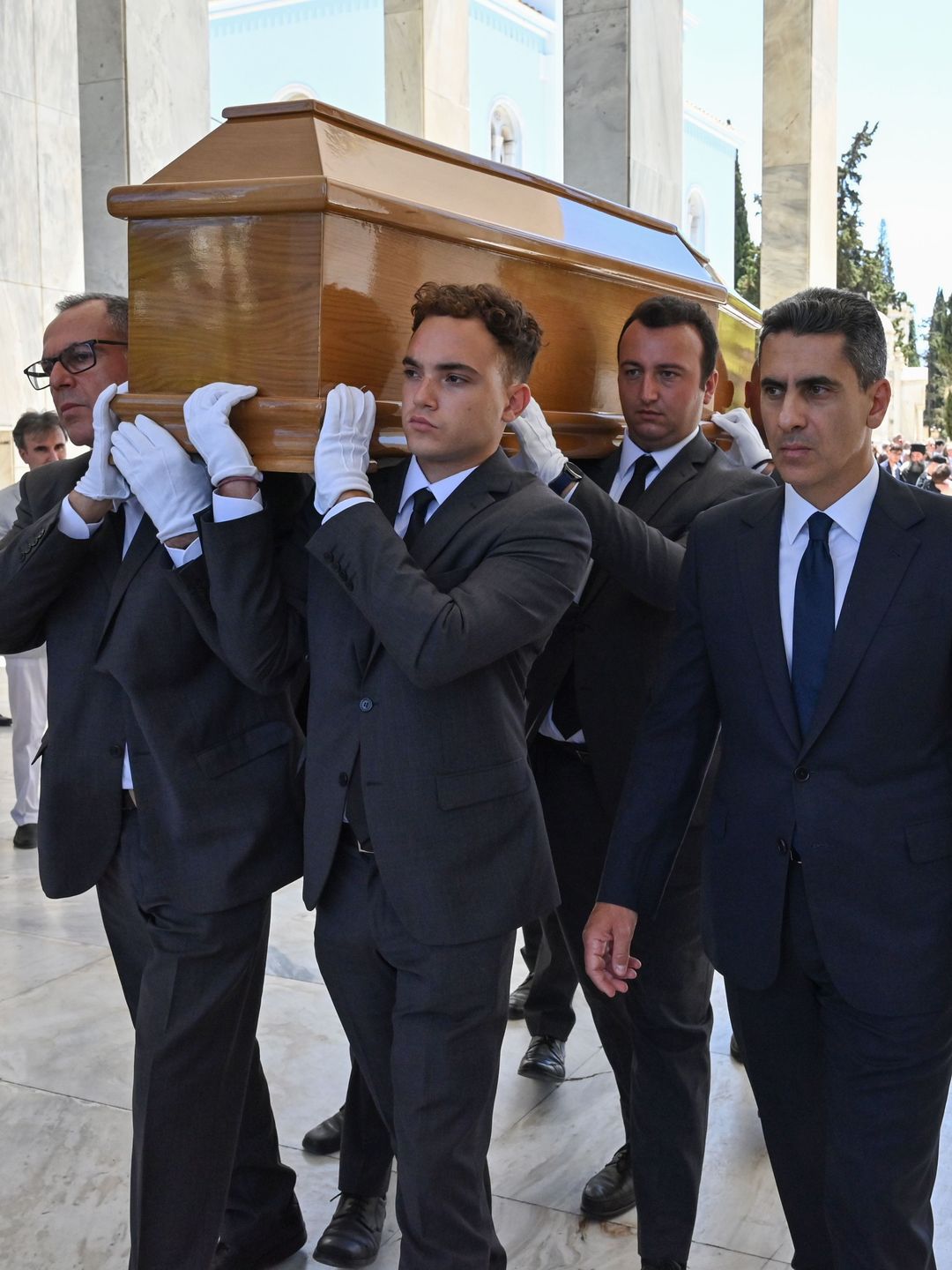 Pallbearers carrying a coffin