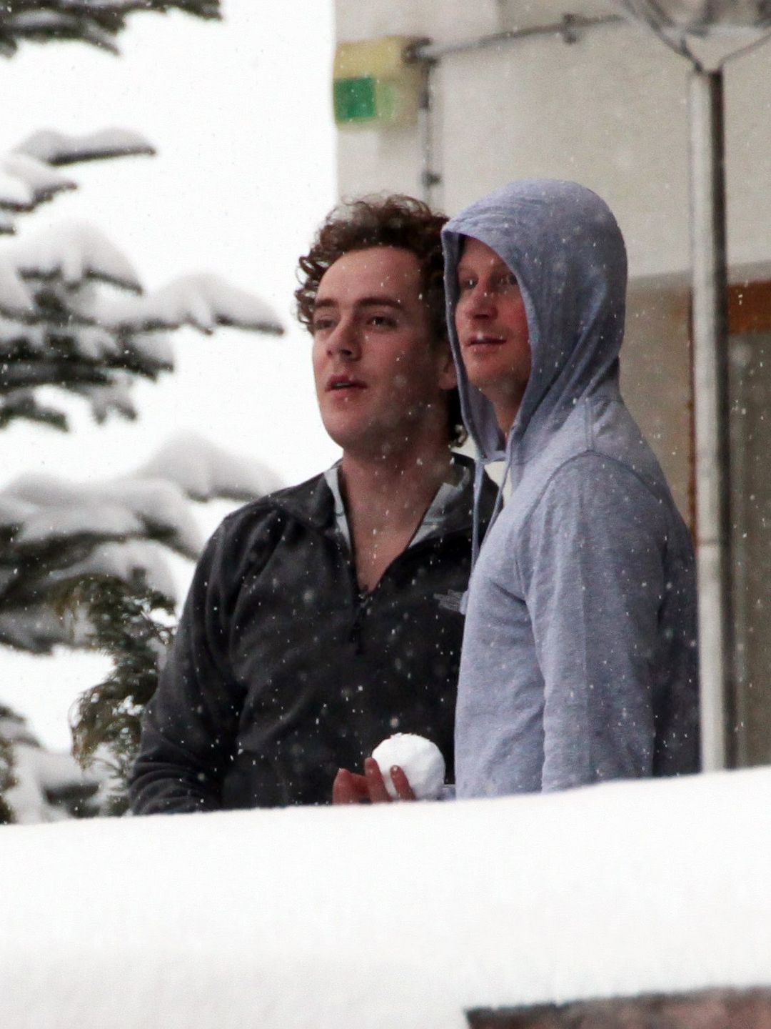 Tom Inskip and Prince Harry throwing snowballs