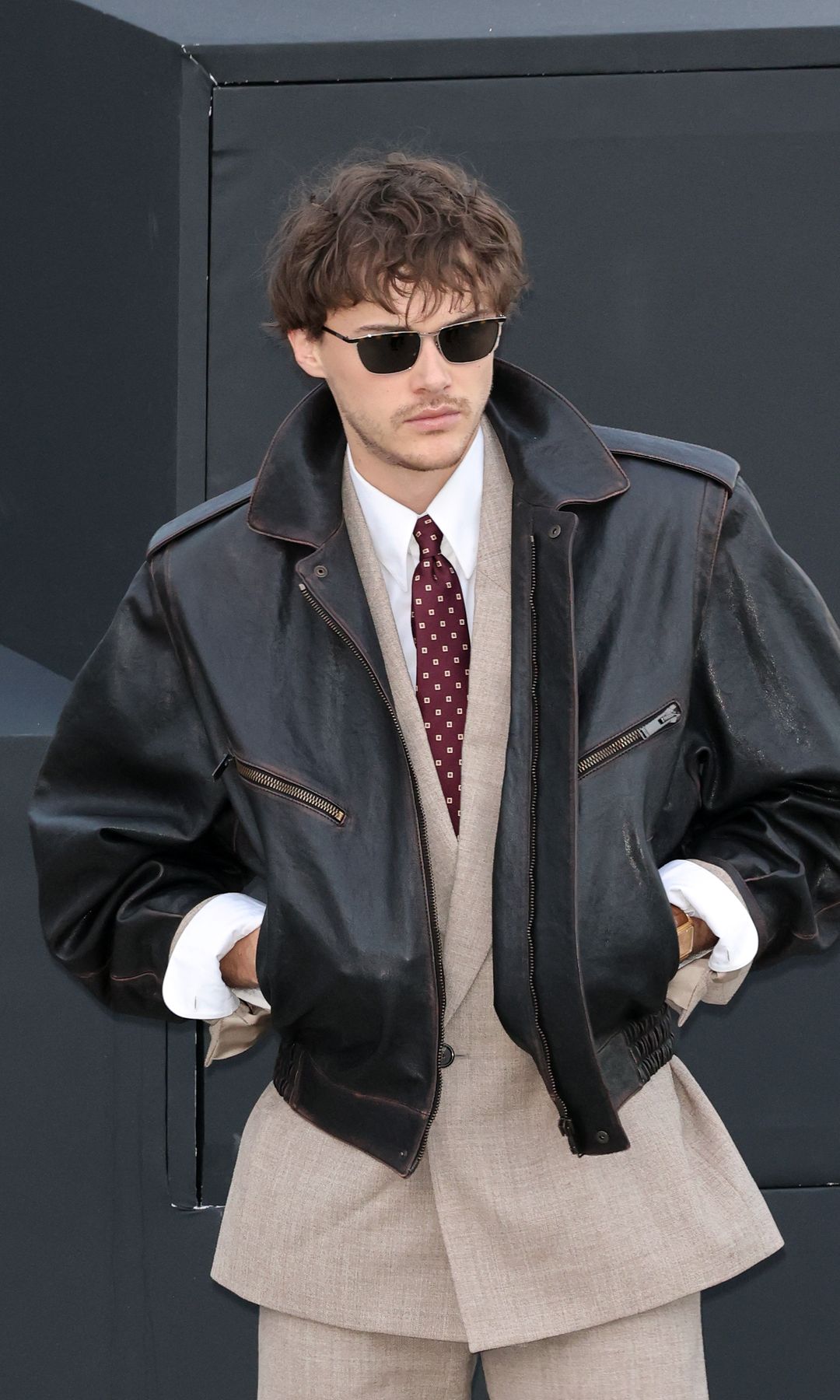 Christopher Briney attends the Saint Laurent Womenswear Spring/Summer 2026 show as part of Paris Fashion Week on September 29, 2025 in Paris, France.
