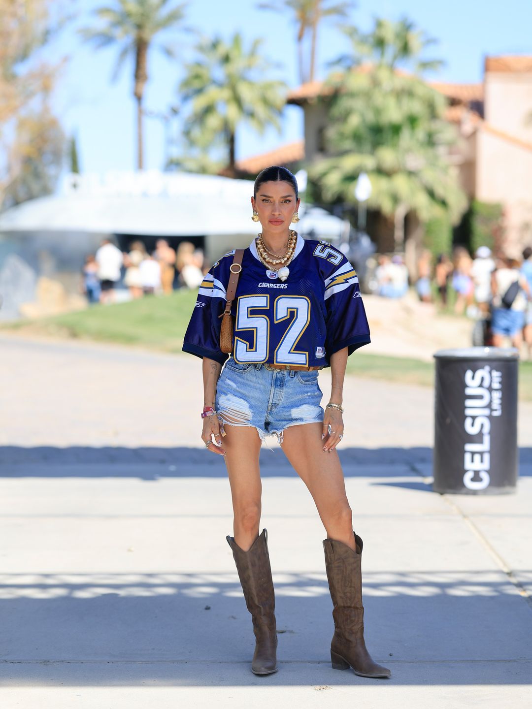 We love Nicole Williams English denim shorts and cowboy boots combo