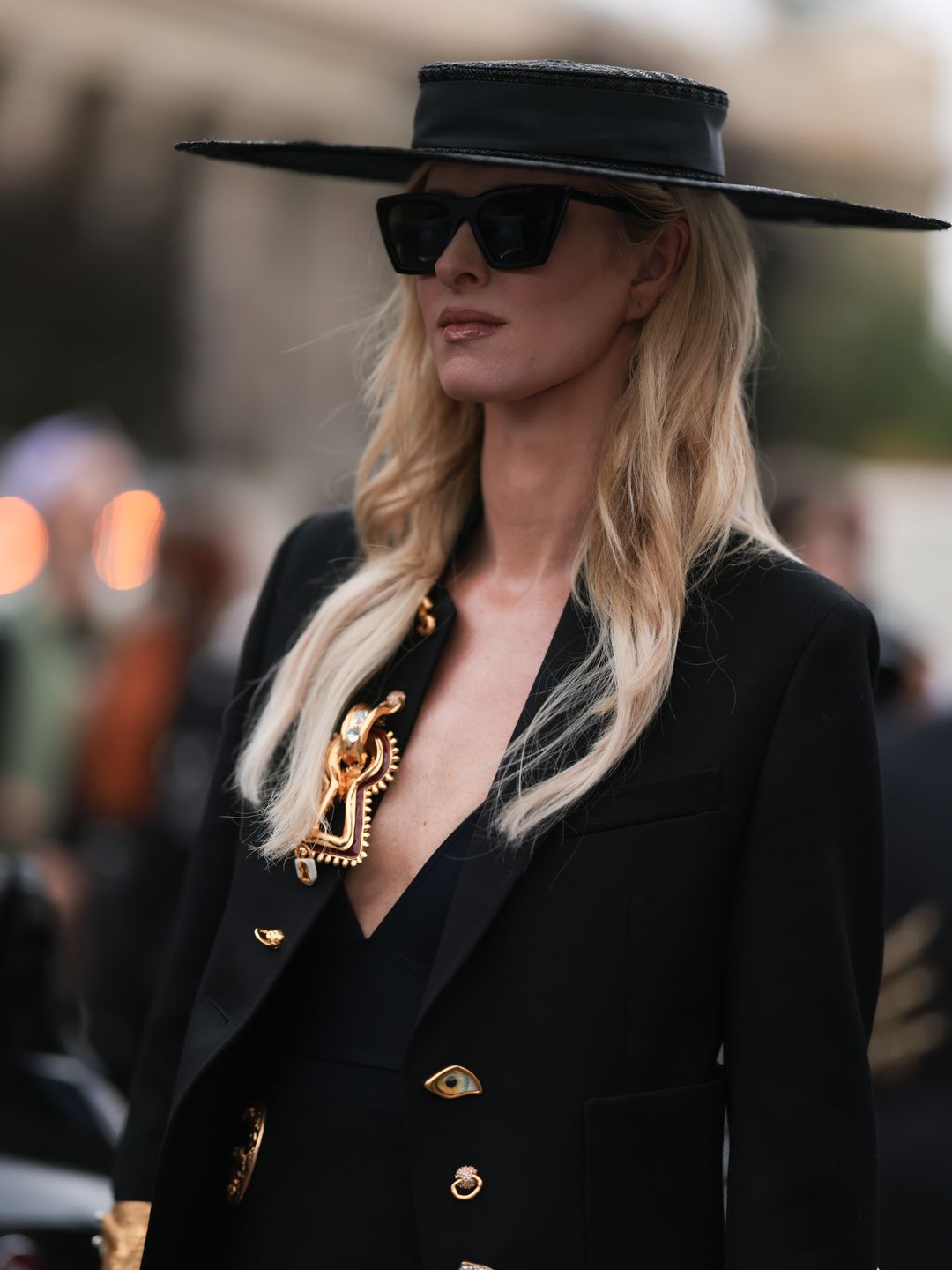Nicky Hilton was seen outside Schiaparelli show wearing one of the label's signature brooches