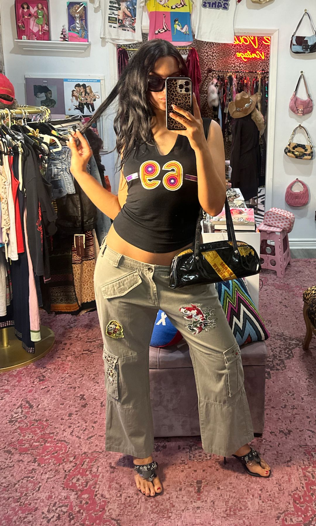For date night, Macy wears Chloé's preloved autumn/winter 2000 '69' top, paired with some low-rise embroidered cargo pants and thong kitten heels