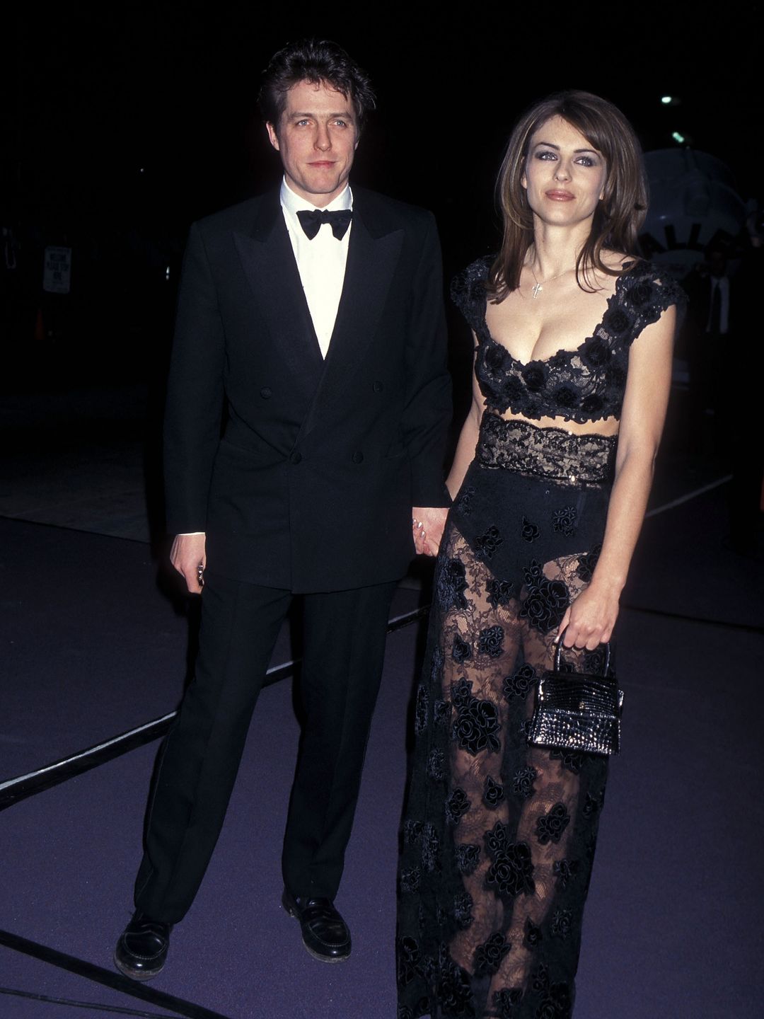 Actor Hugh Grant and actress Elizabeth Hurley attend "Happy Birthday Elizabeth: A Celebration of Life" Television Special to Celebrate Elizabeth Taylor's 65th Birthday on February 16, 1997 at the Pantages Theatre in Hollywood, California. 