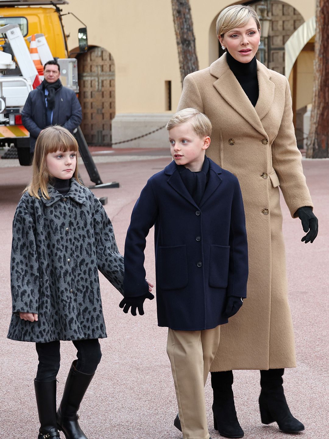 Twins Jacques and Gabriella hold hands as they walked through The Palace Square