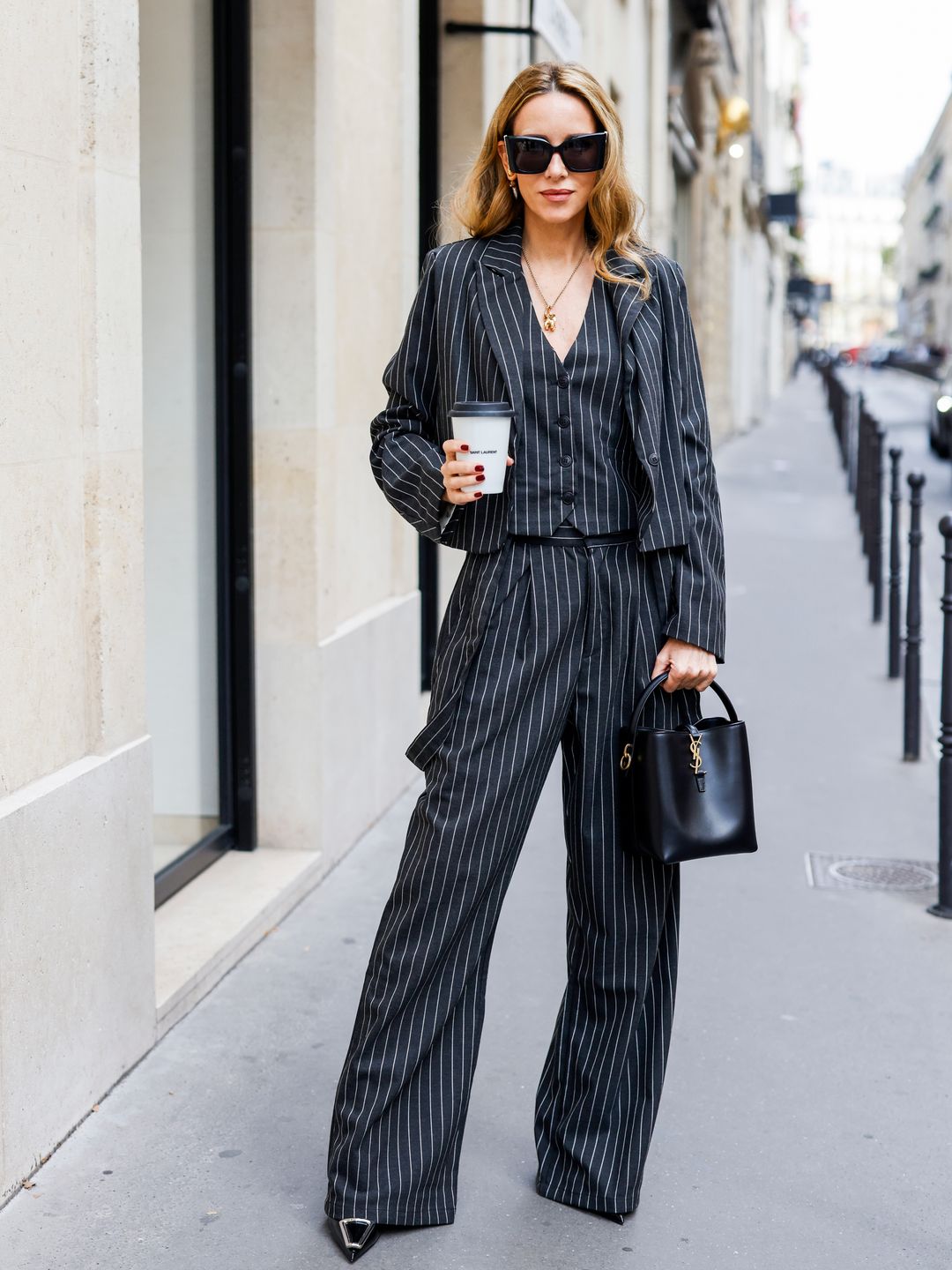 Alexandra Lapp wears a pinstripe waistcoat with a matching blazer and trousers 