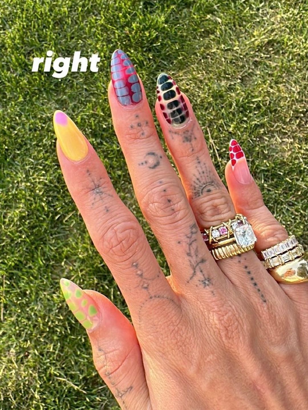 Hailey Bieber's right hand manicure featuring geometric accents 