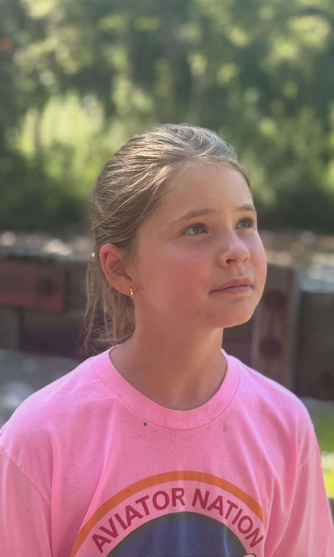 Jenna Bush Hager's daughter Mila poses for a sunkissed photo in their lawn shared on Instagram