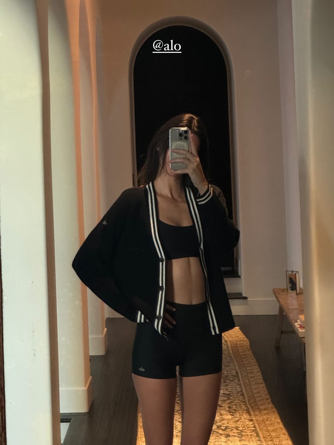 Kendall Jenner snaps a mirror selfie in an all-black athlesiure ensemble 
