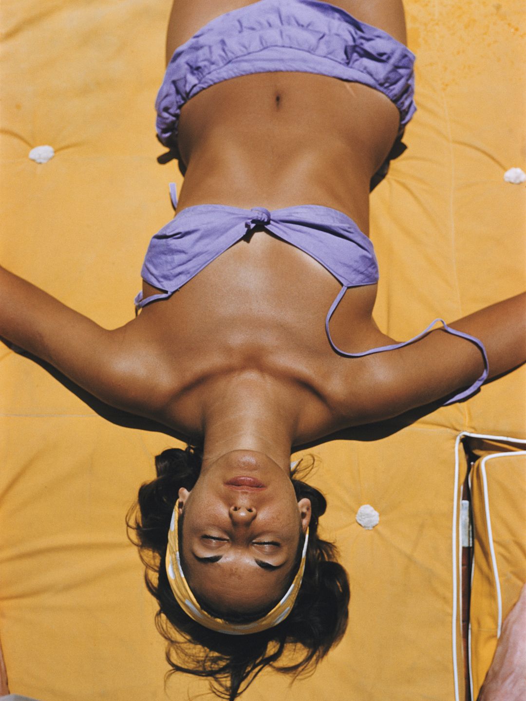 Bianca Volpato sunning herself at Capri in a lilac coloured bikini
