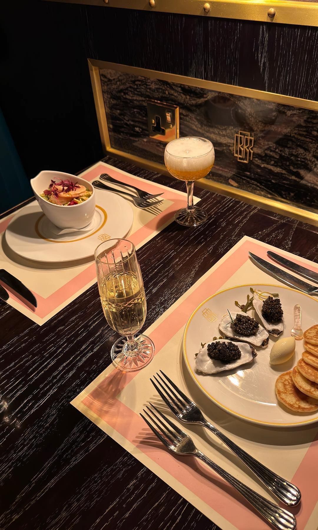 A photo of two meals at Bob Bob Ricard in London