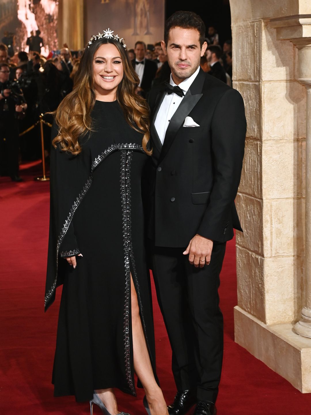 Kelly Brook and Jeremy Parisi in black outfits