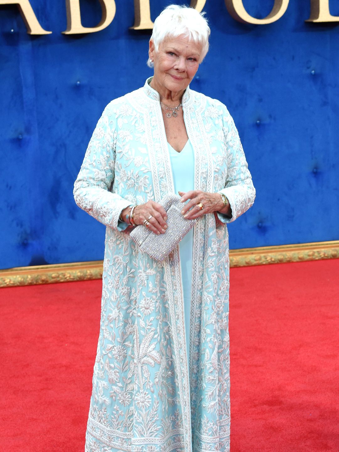 judi dench in sky blue outfit