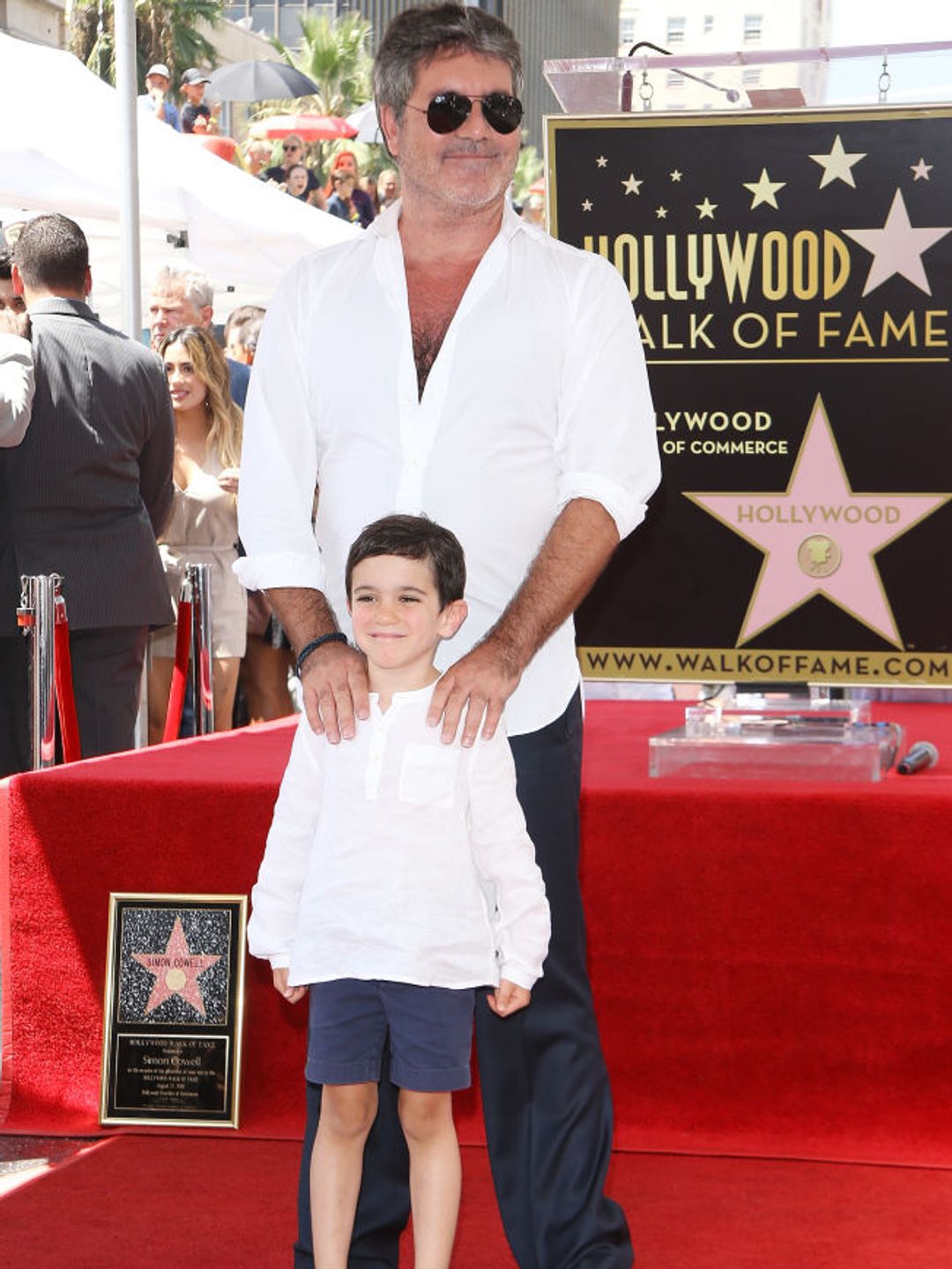 Simon Cowell and his son, Eric Cowell attend the ceremony honoring Simon Cowell with a Star on The Hollywood Walk of Fame held on August 22, 2018