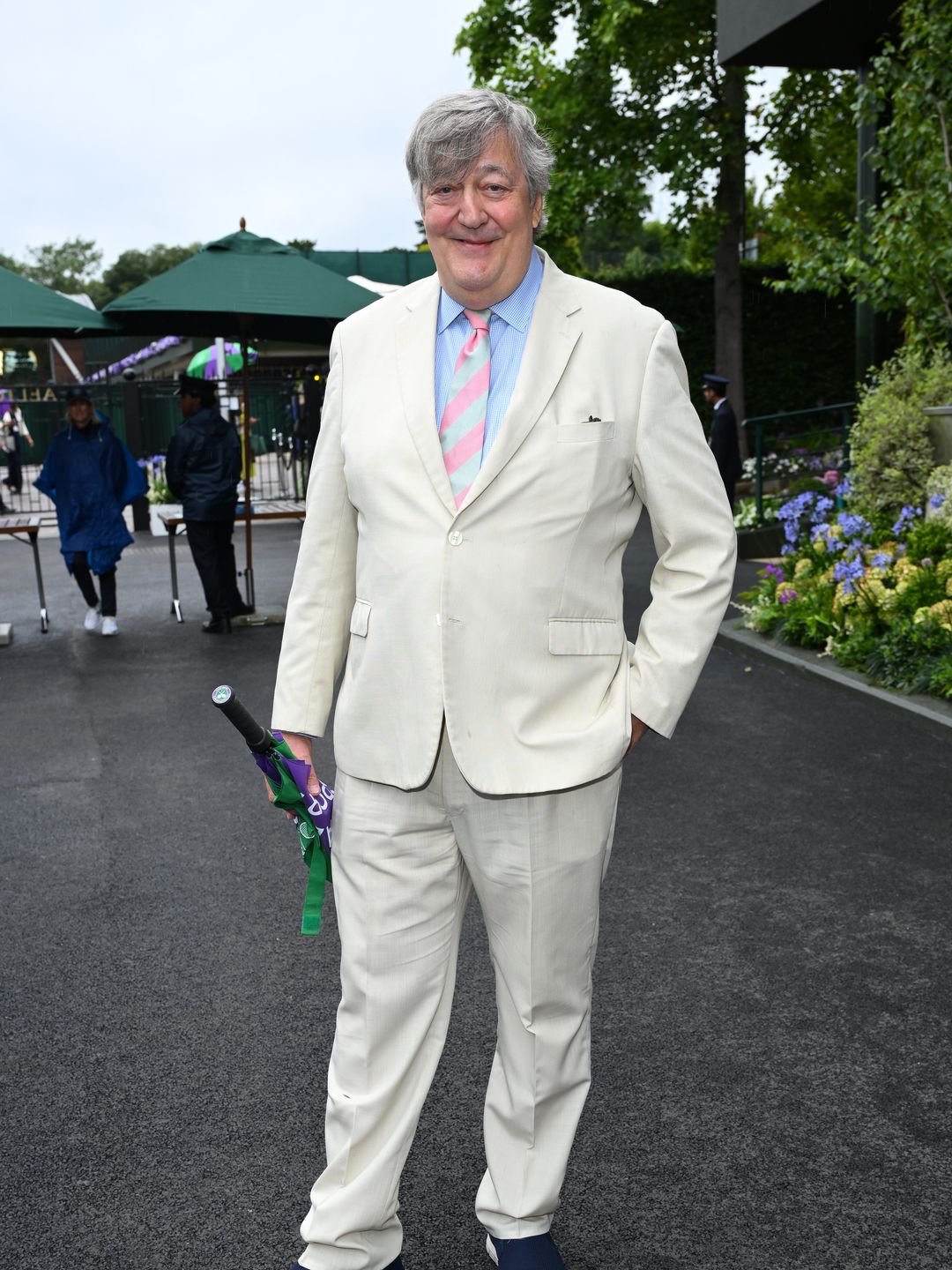 stephen fry at wimbledon in cream suit