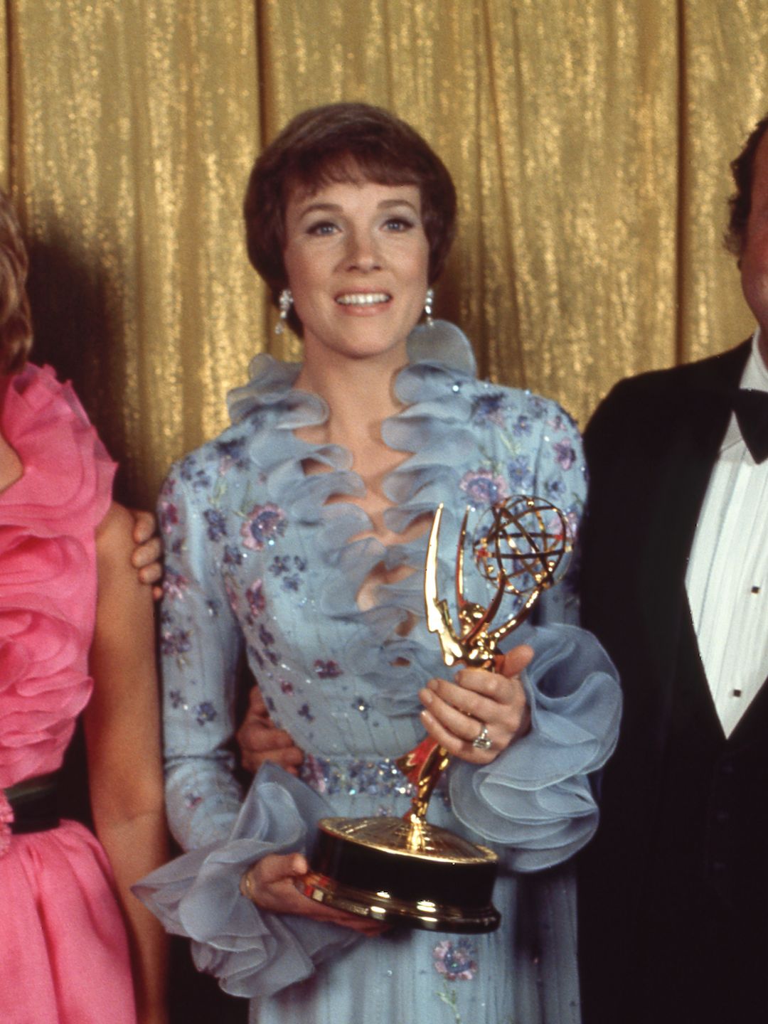 LOS ANGELES, CA - MAY 6: (L-R) Peter Falk, Mitzi Gaynor, Julie Andrews and William Conrad holding their Emmy Awards in the press room at The 24th Primetime Emmy Awards on May 6, 1972 at Pantages Theatre, Los Angeles, California. (Photo by Disney General Entertainment Content via Getty Images)