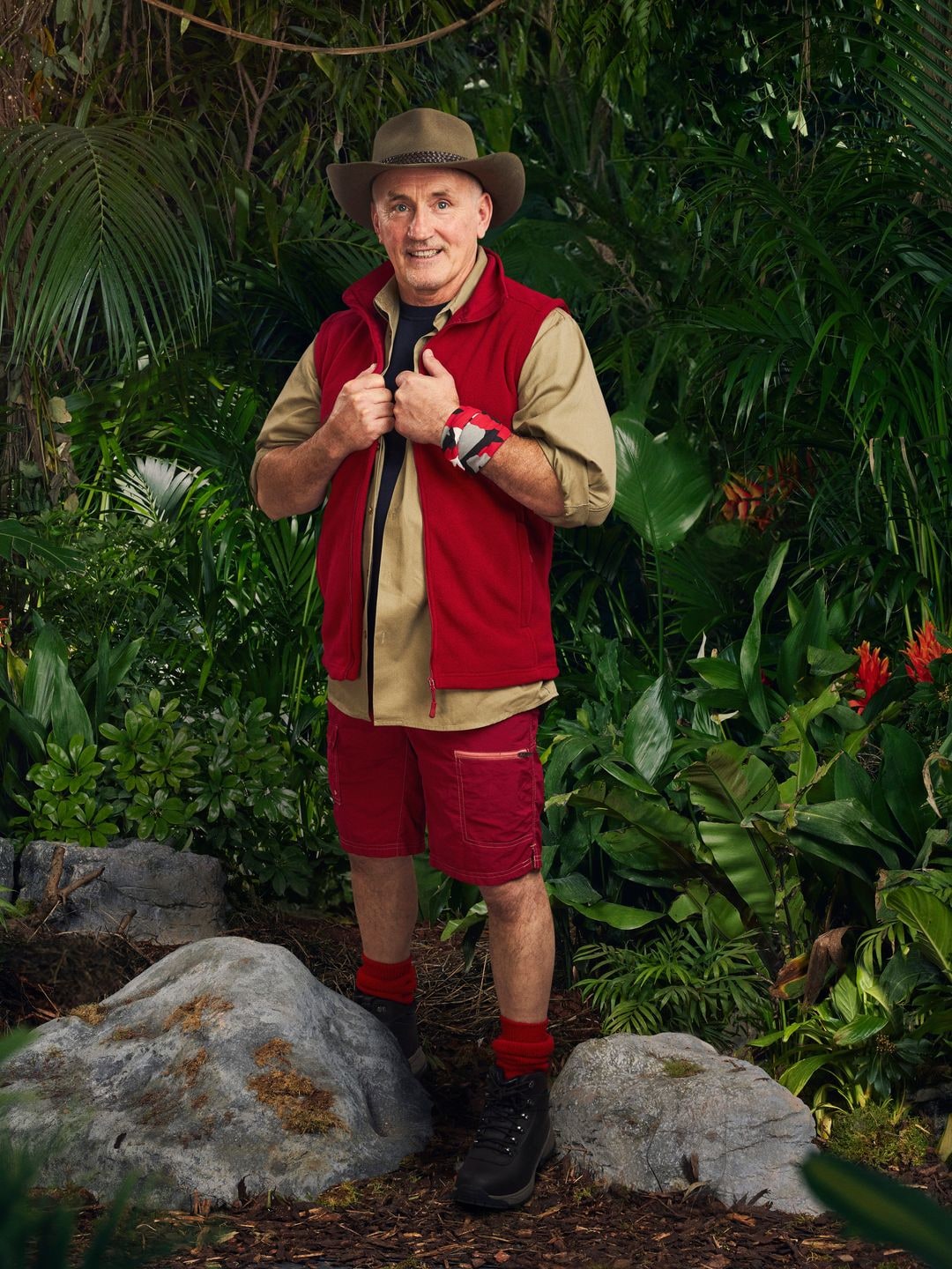 i'm a celeb contestant in red outfit 