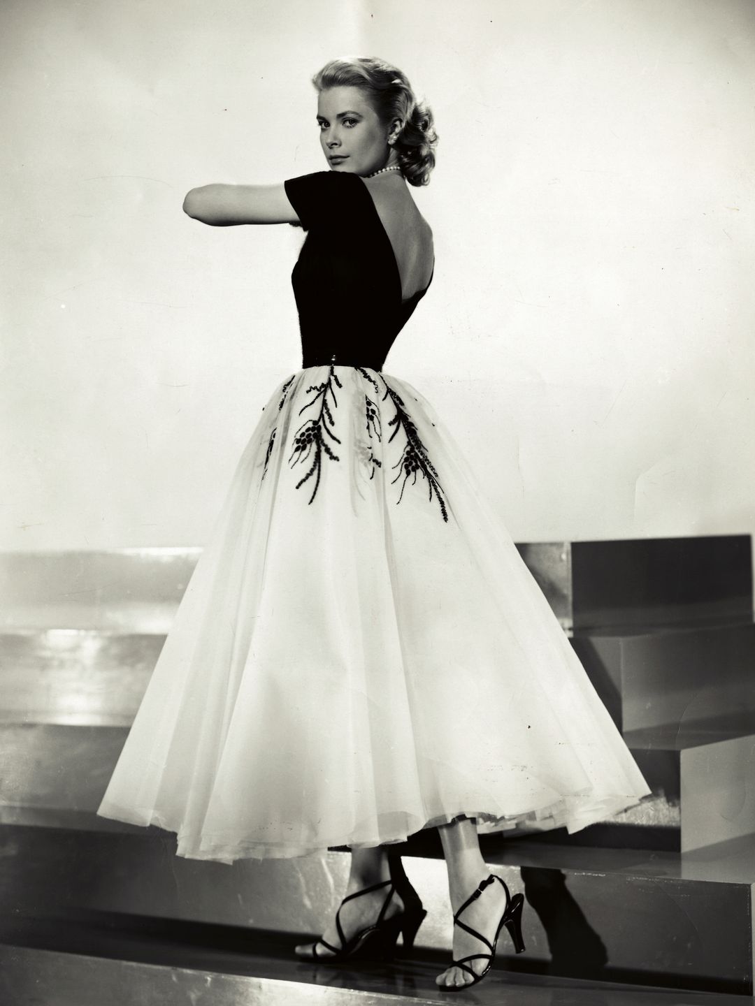 Grace Kelly wearing a wide circle skirt 