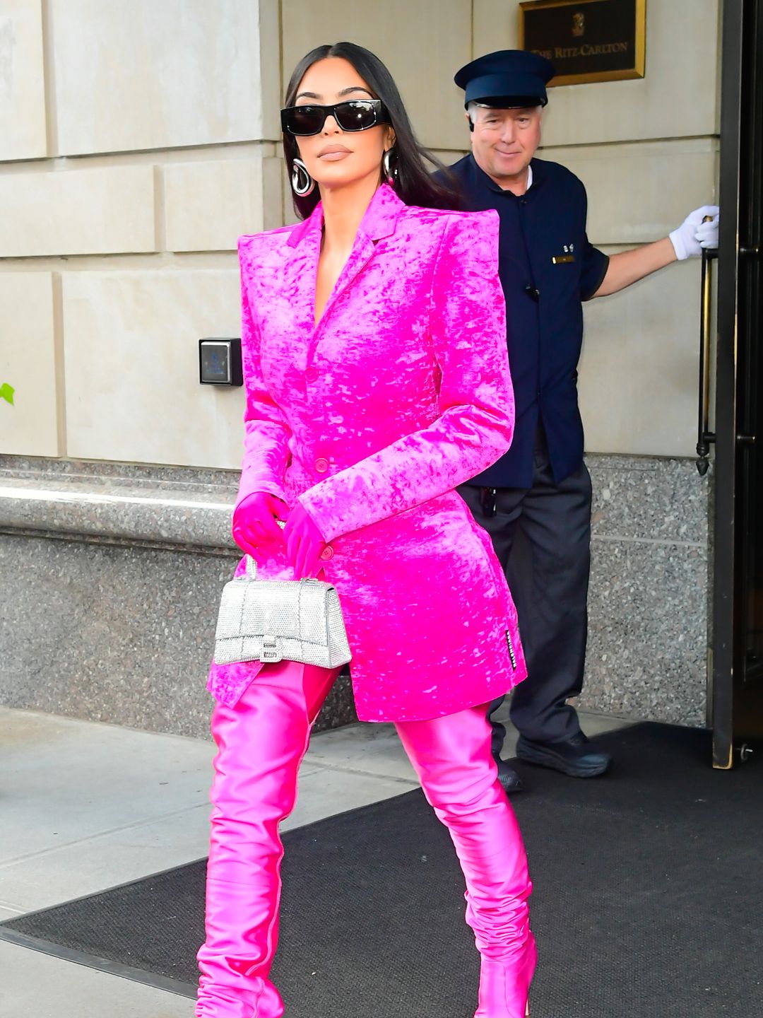 Kim Kardashian in a pink velvet jacket