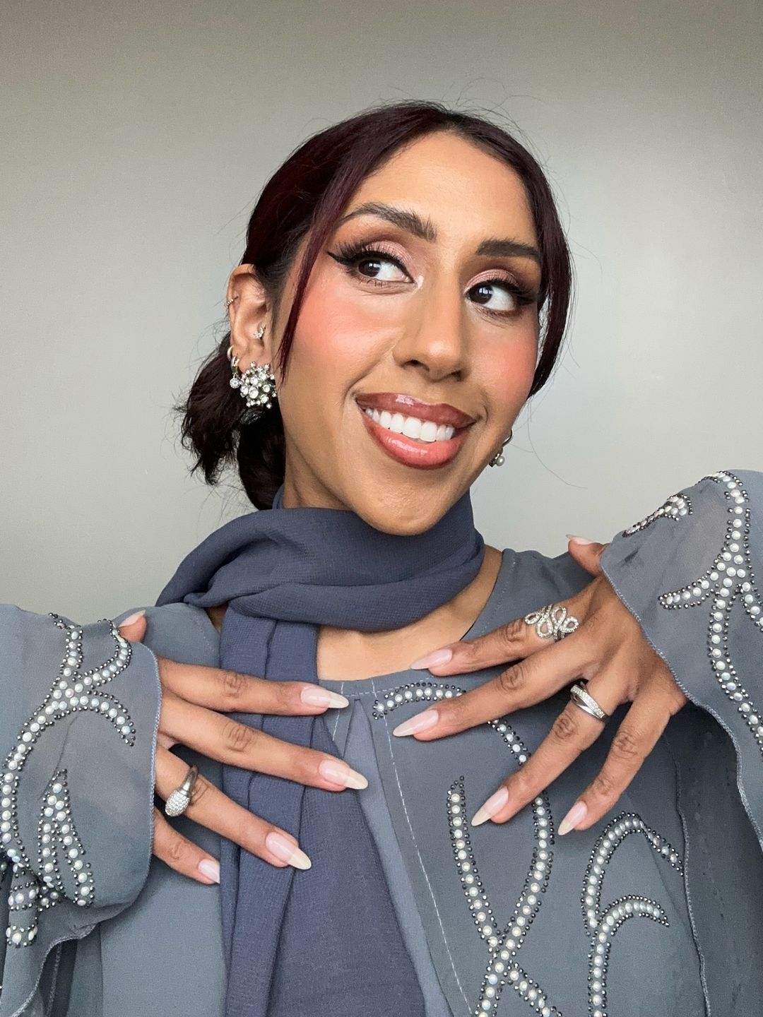 Aamirah Essof smiling, showing off her going out makeup