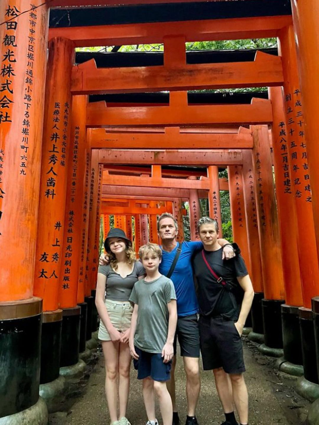 Neil Patrick Harris, David Burtka and their twins underneath Japanese arches