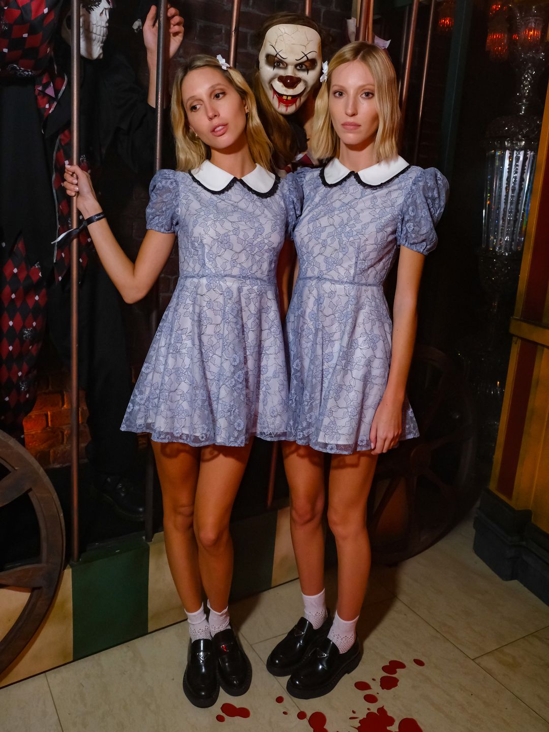 Princess Maria-Olympia of Greece and Denmark and Ella Richards dressed as the creepy twins from The Shining