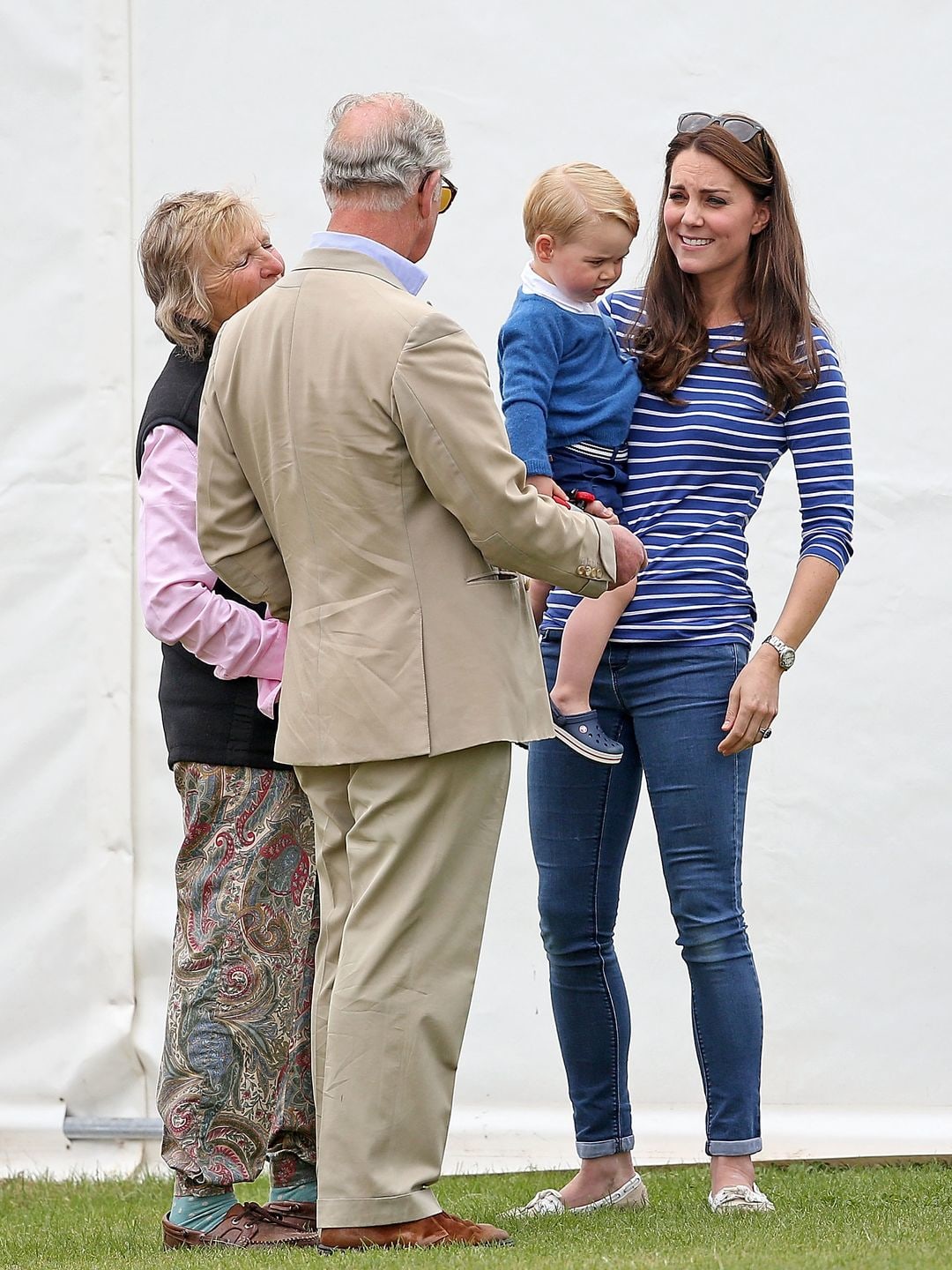 Kate with Charles and George at the polo