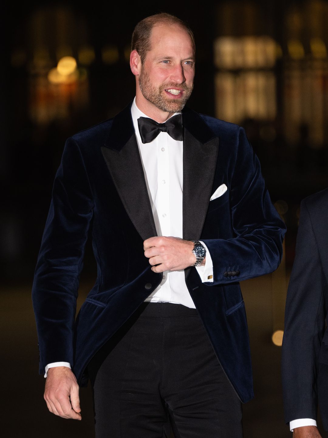 Prince William wearing a black tuxedo