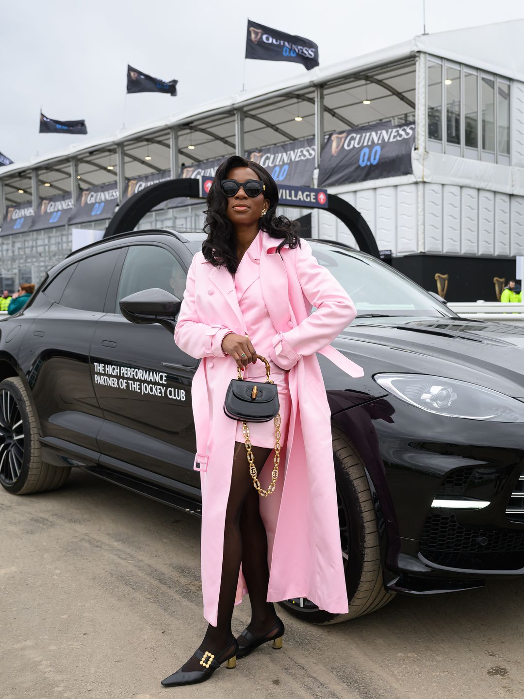 Onyi Moss attends Style Wednesday, day two of the Cheltenham Festival at Cheltenham Racecourse 