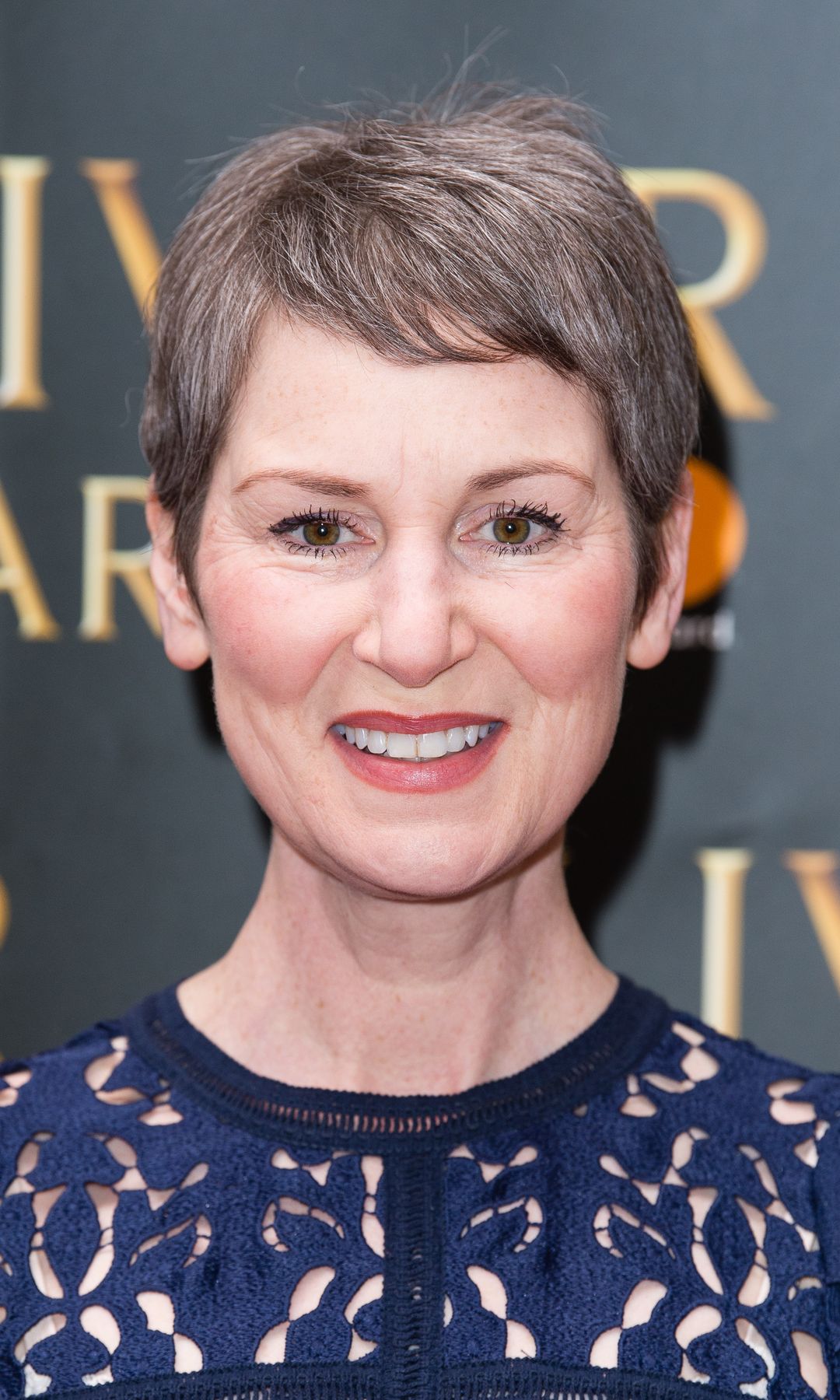 Josie Walker in a blue dress at the Olivier Awards