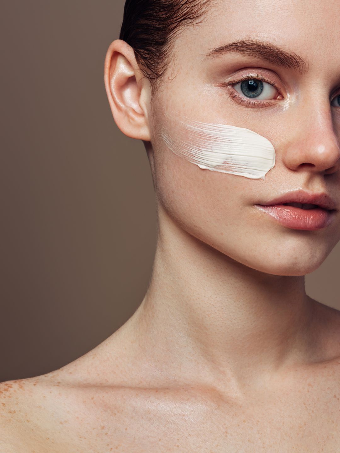 Model with skincare on her face 