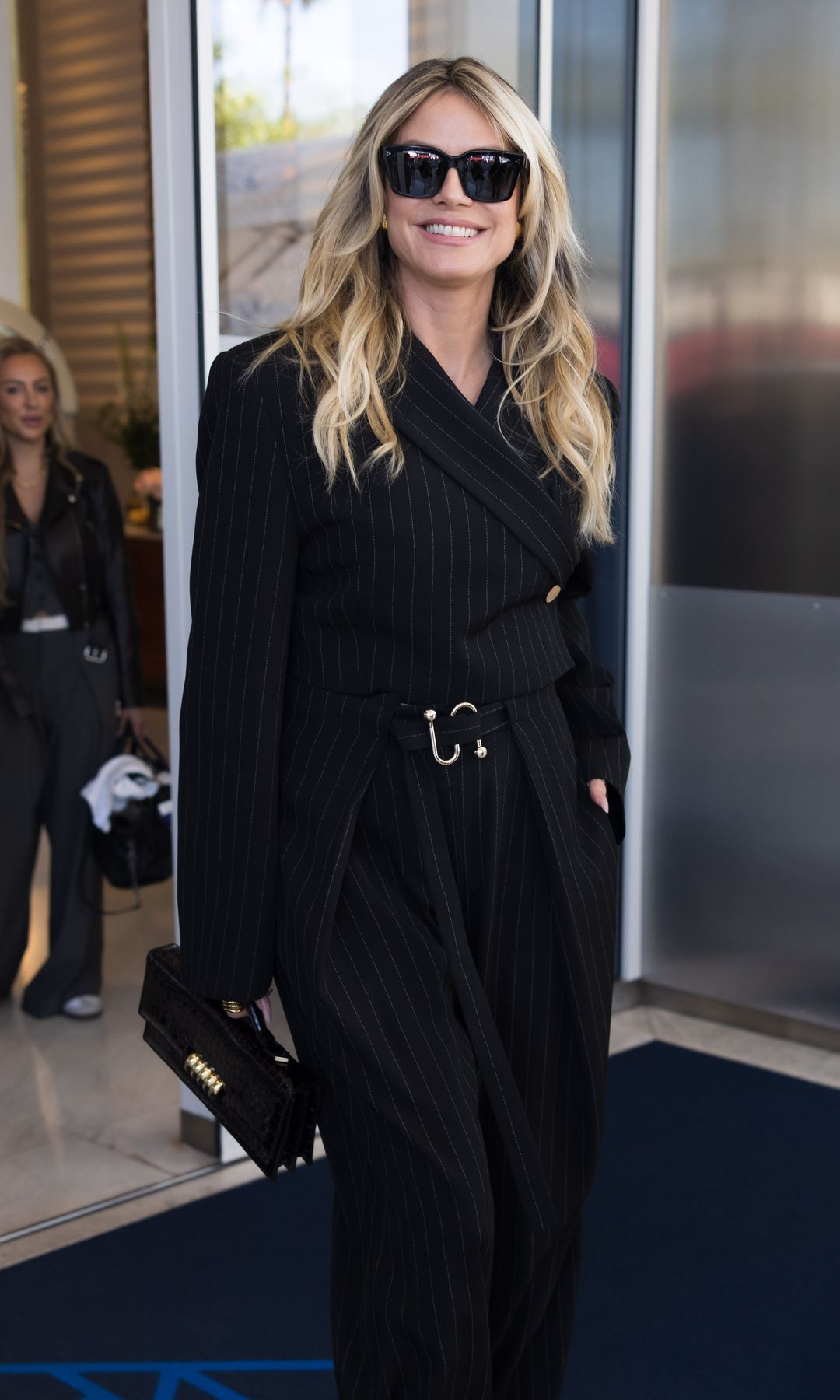 Heidi Klum in a black jumpsuit