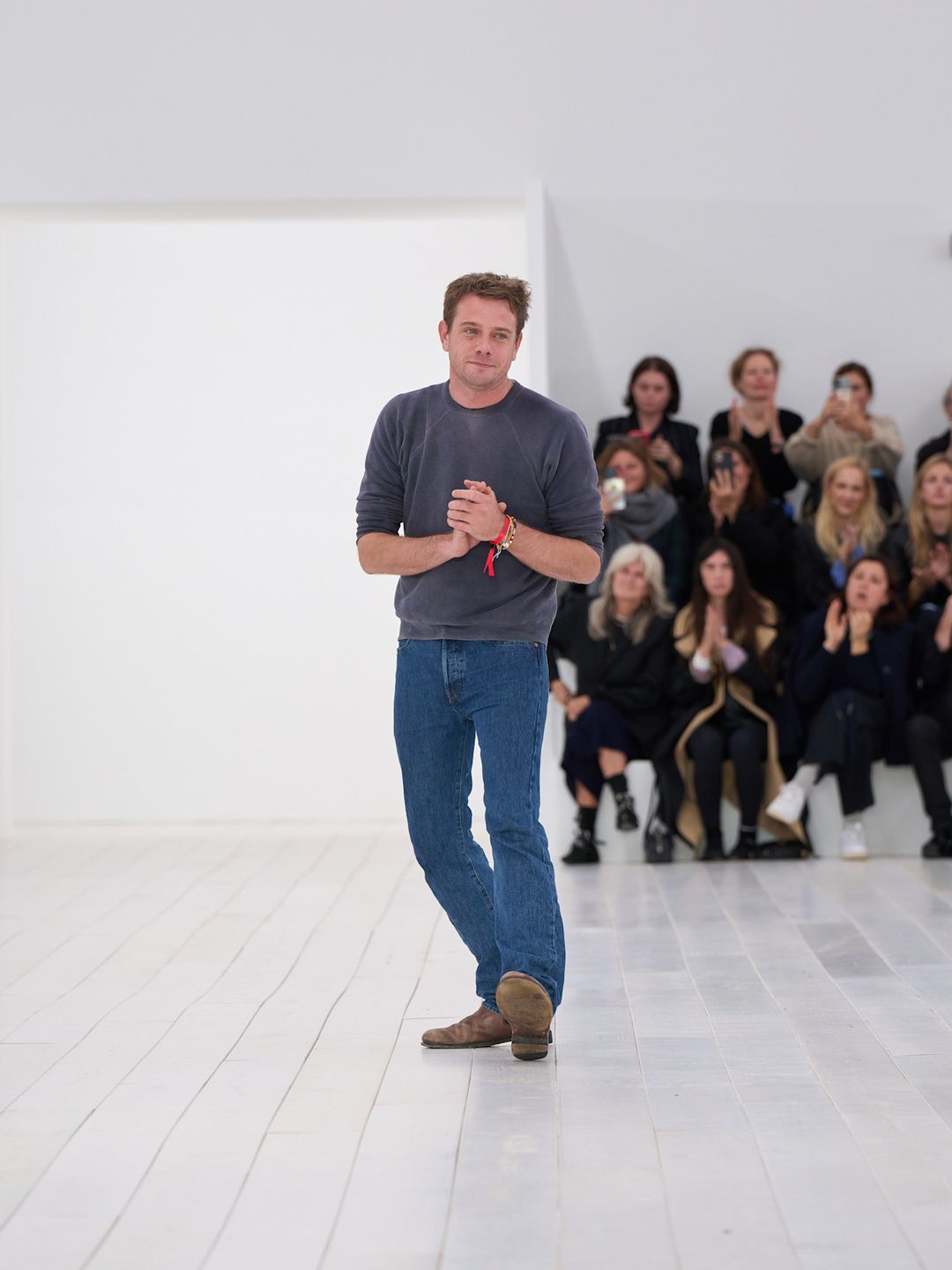 Jonathan Anderson at the finale of the Loewe SS25 show