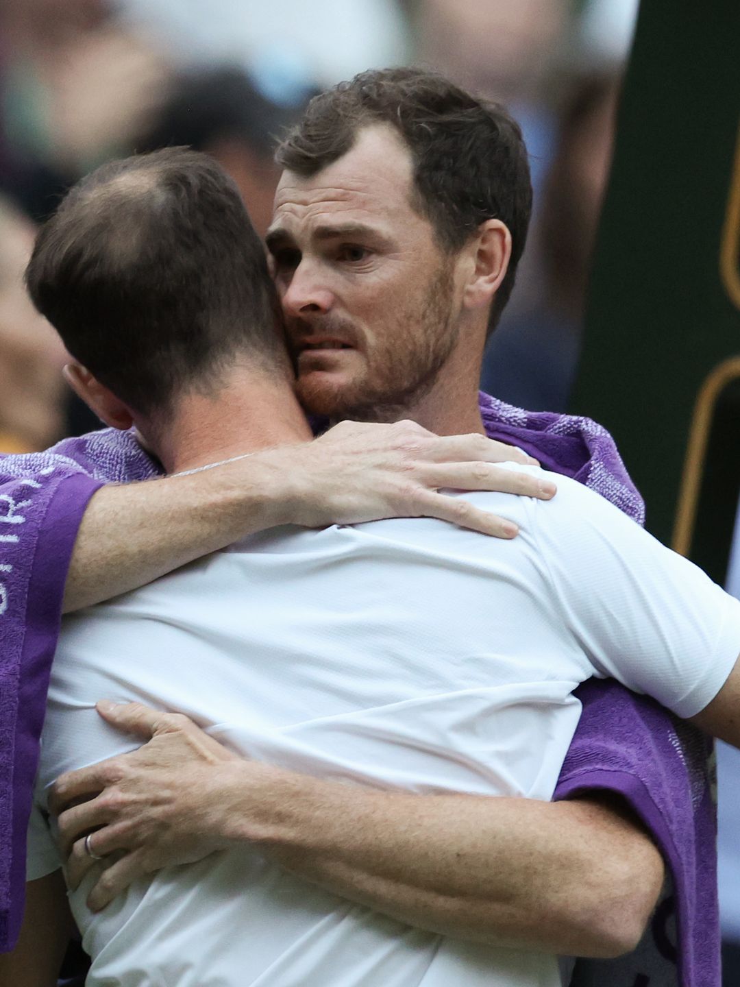 Andy Murray and Jamie Murray hugging