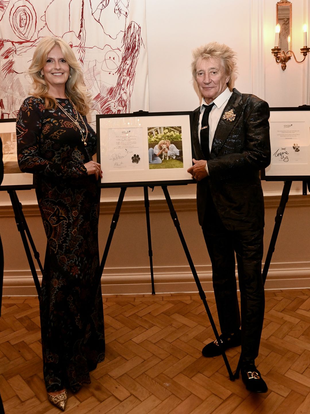 Penny and Rod Stewart with their pet portrait