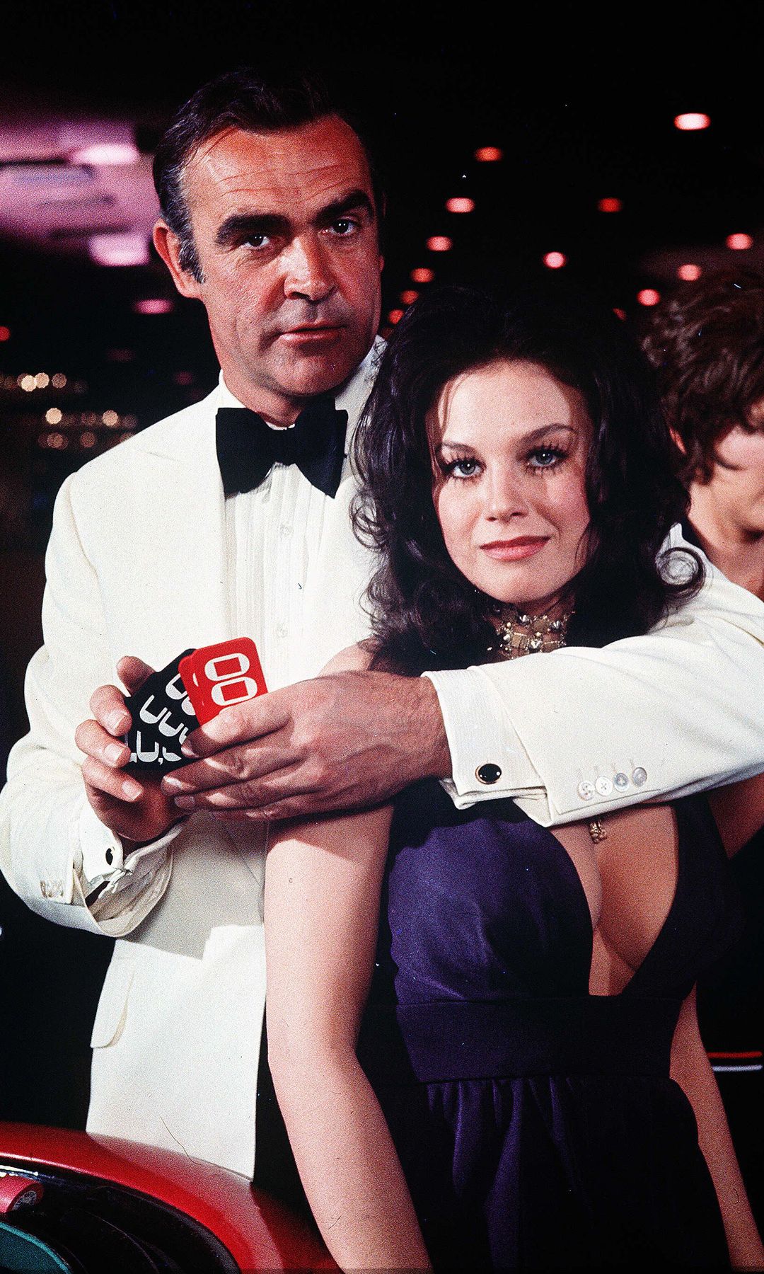 Sean Connery with his arm around Lana Wood in Diamonds Are Forever