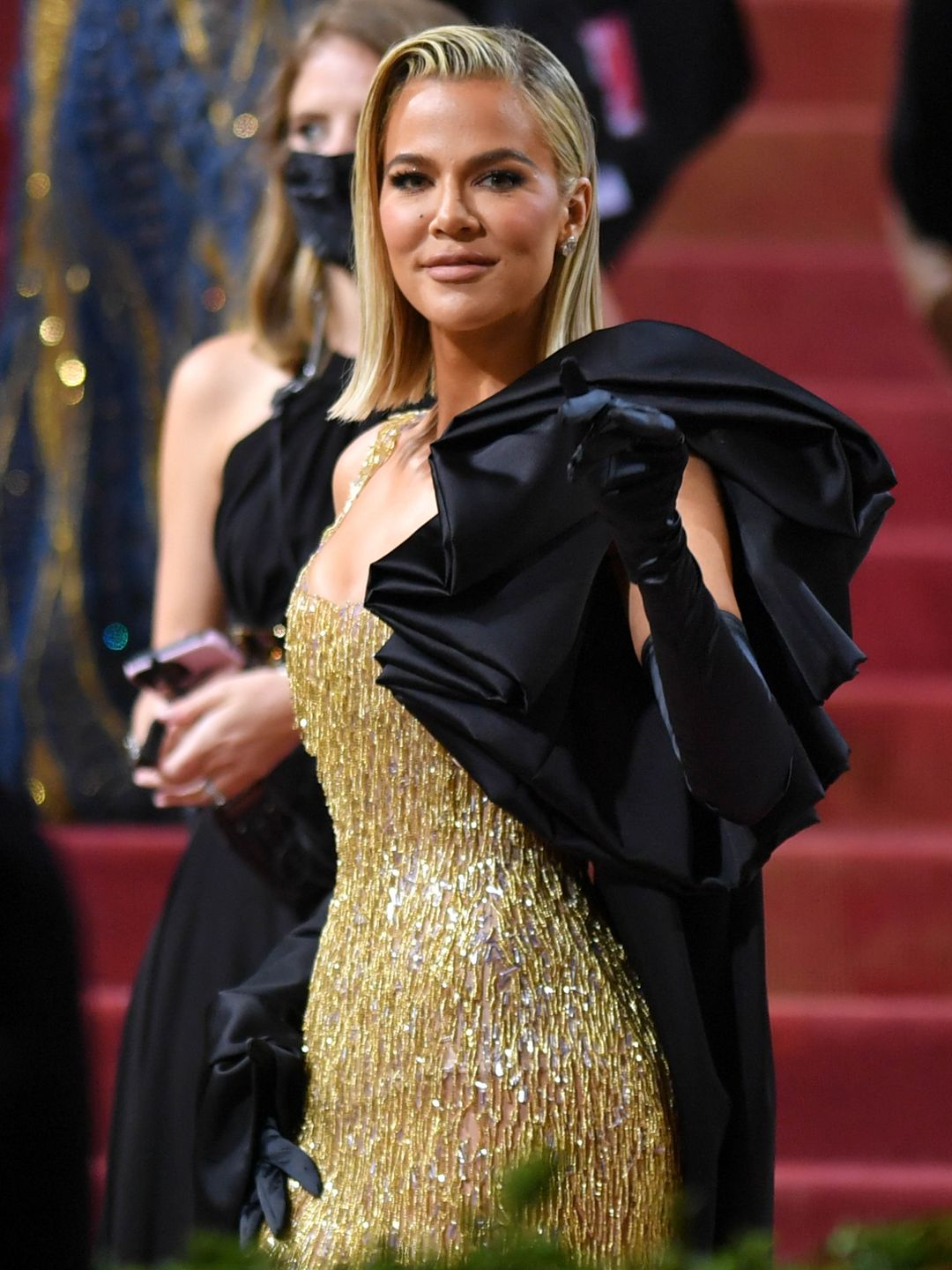 Khloe Kardashian posing on the Met Gala red carpet
