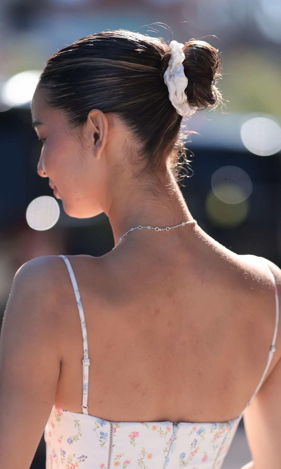 office hairstyles bun in a scrunchie