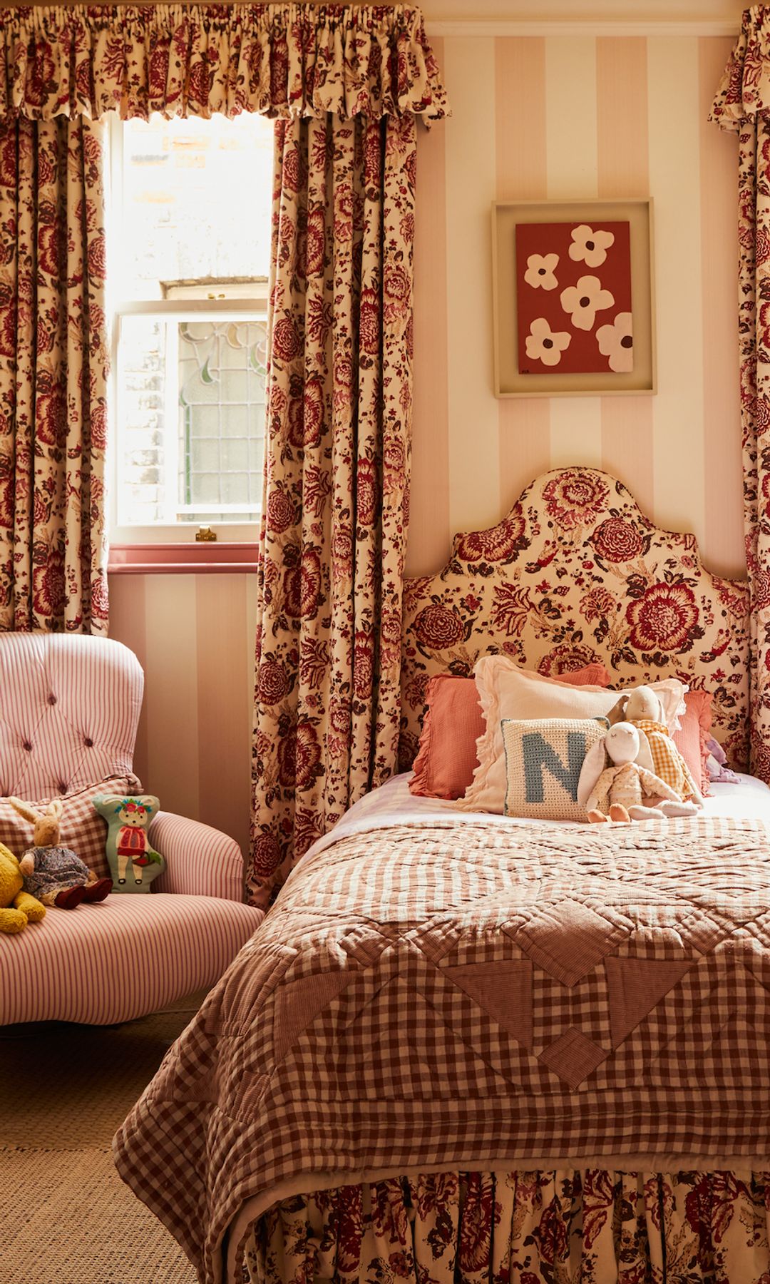 Her daughters' bedrooms feature pinks and florals