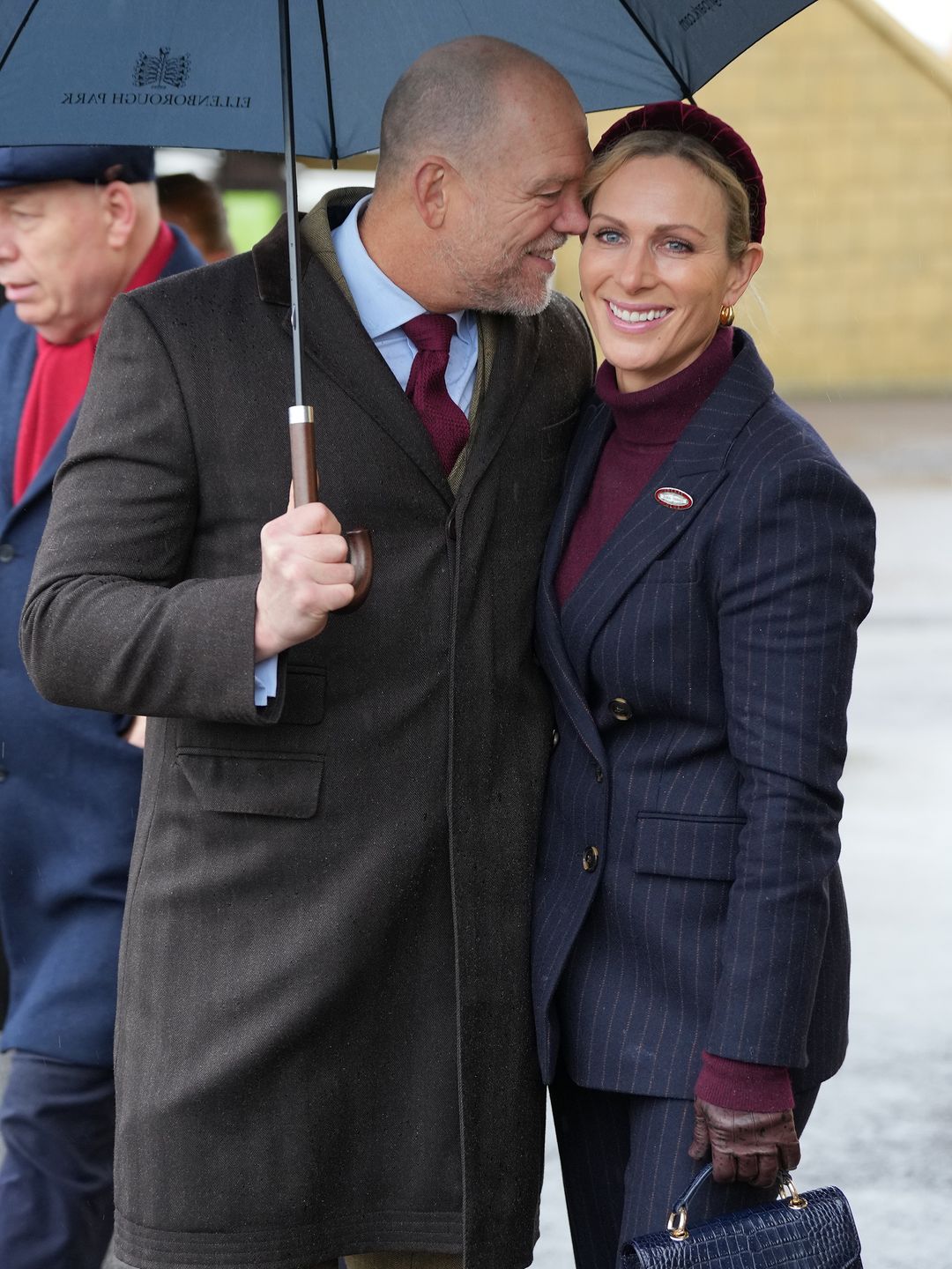 couple embracing at races