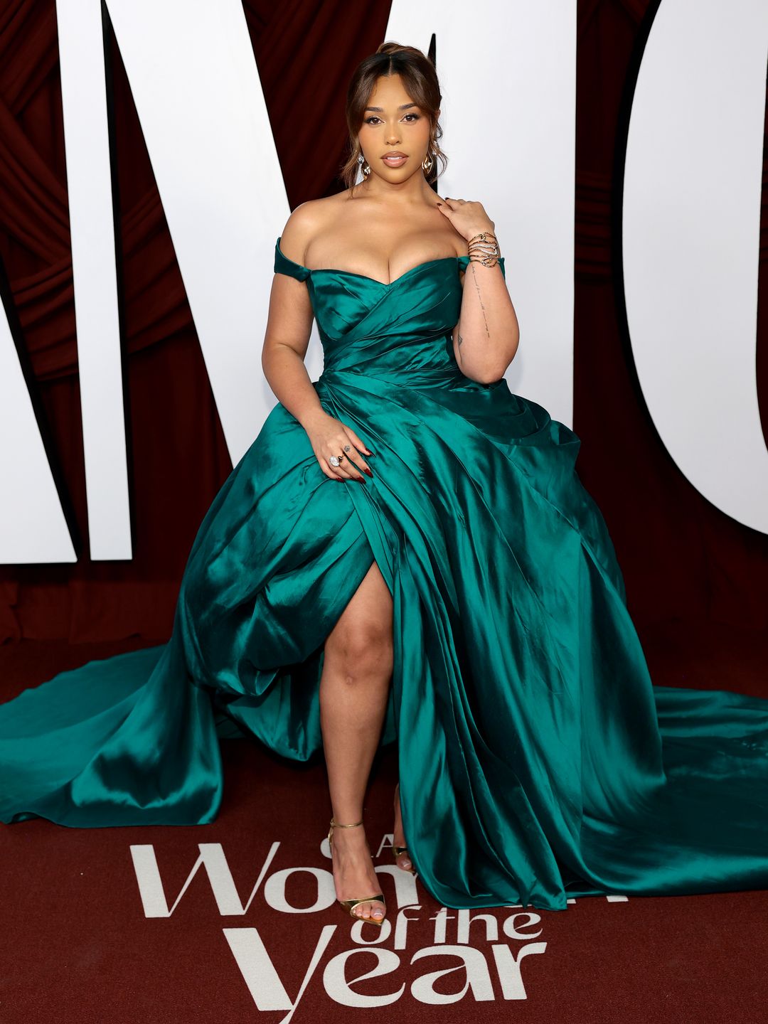 woman in emerald silk dress