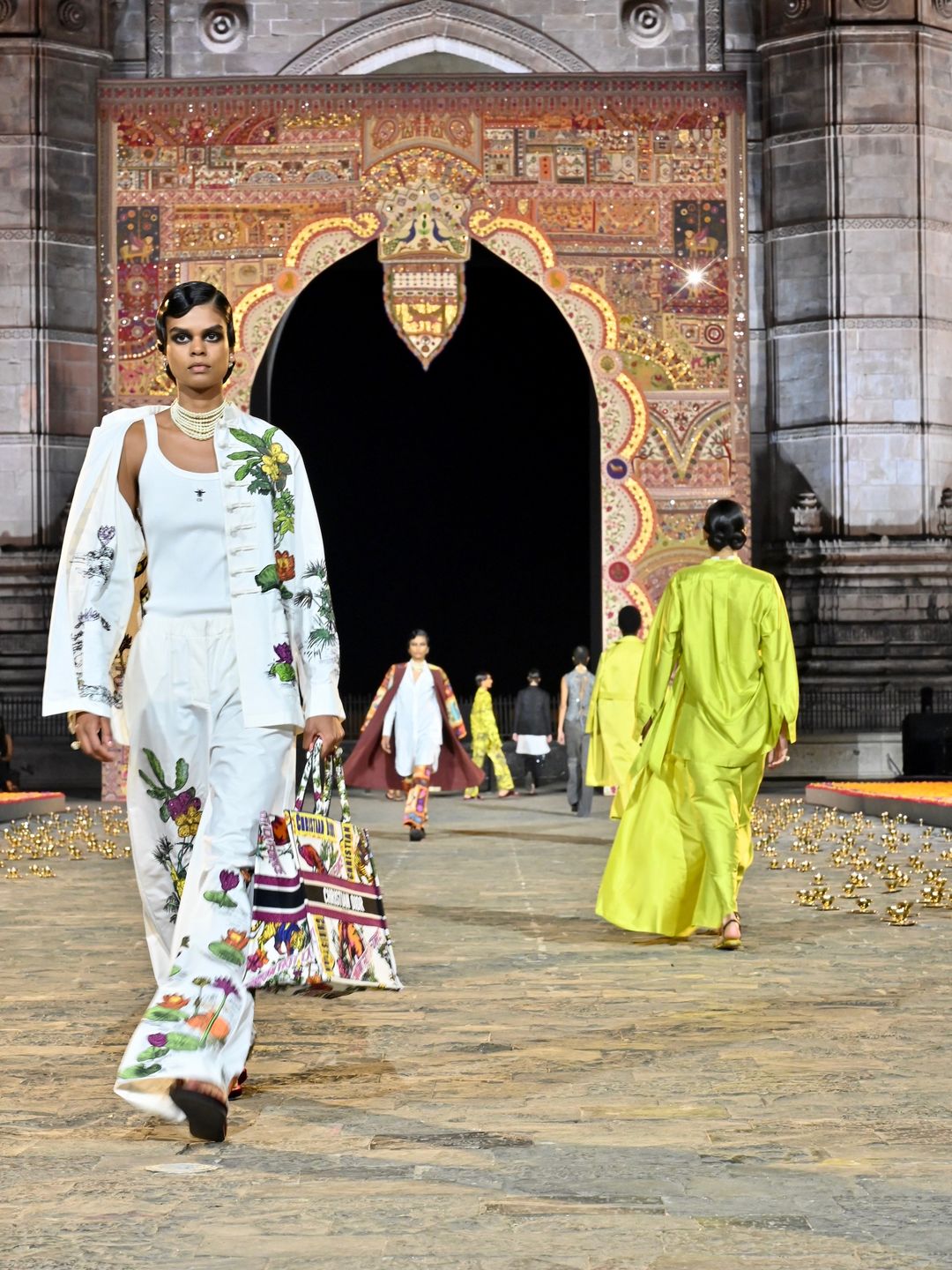 MUMBAI, INDIA - MARCH 30: A model walks the runway during the Dior Fall 2023 show at the Gateway of India monument on March 30, 2023 in Mumbai, India. (Photo by Rubina A. Khan/Getty Images)