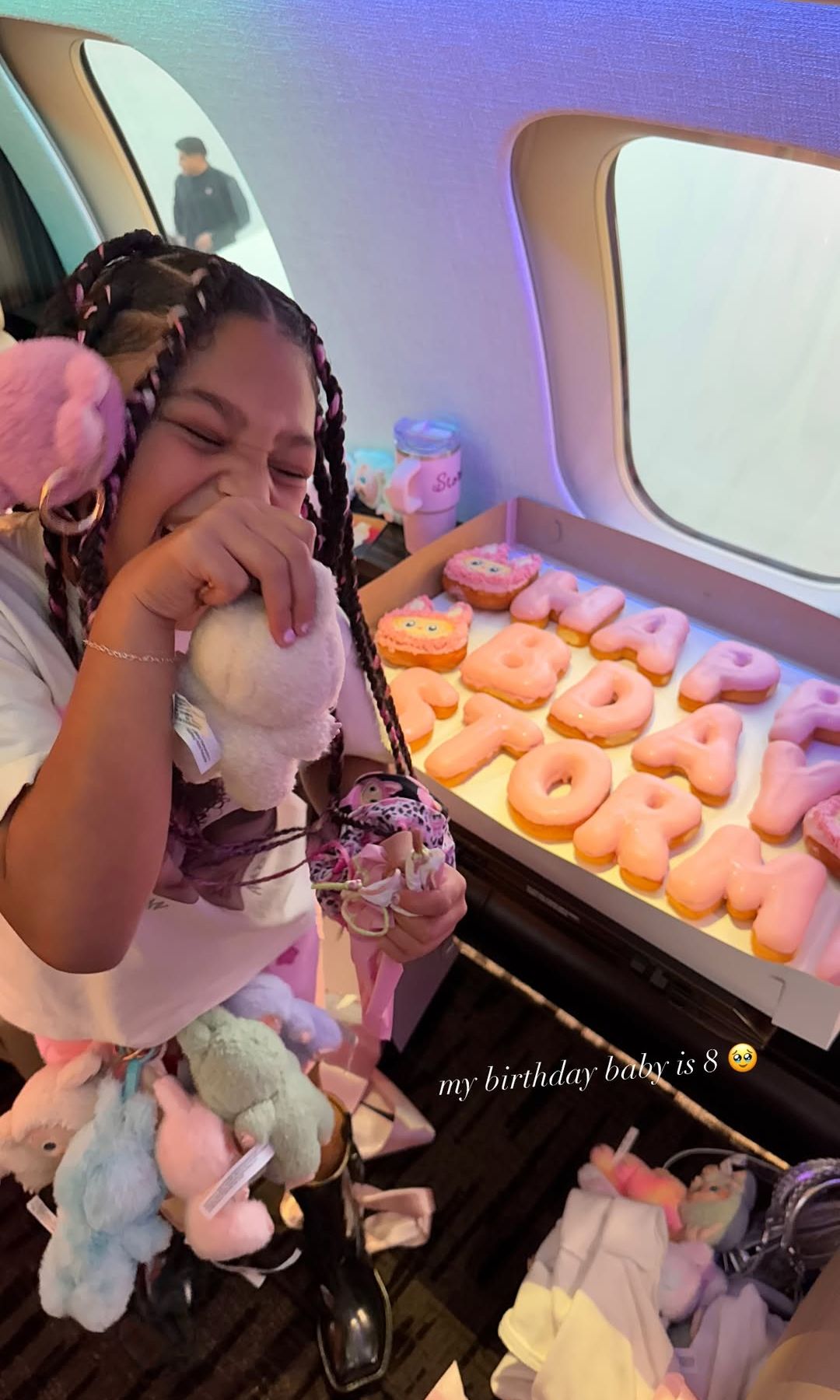 Stormi Webster poses with her custom Labubus and birthday cake, shared on Instagram