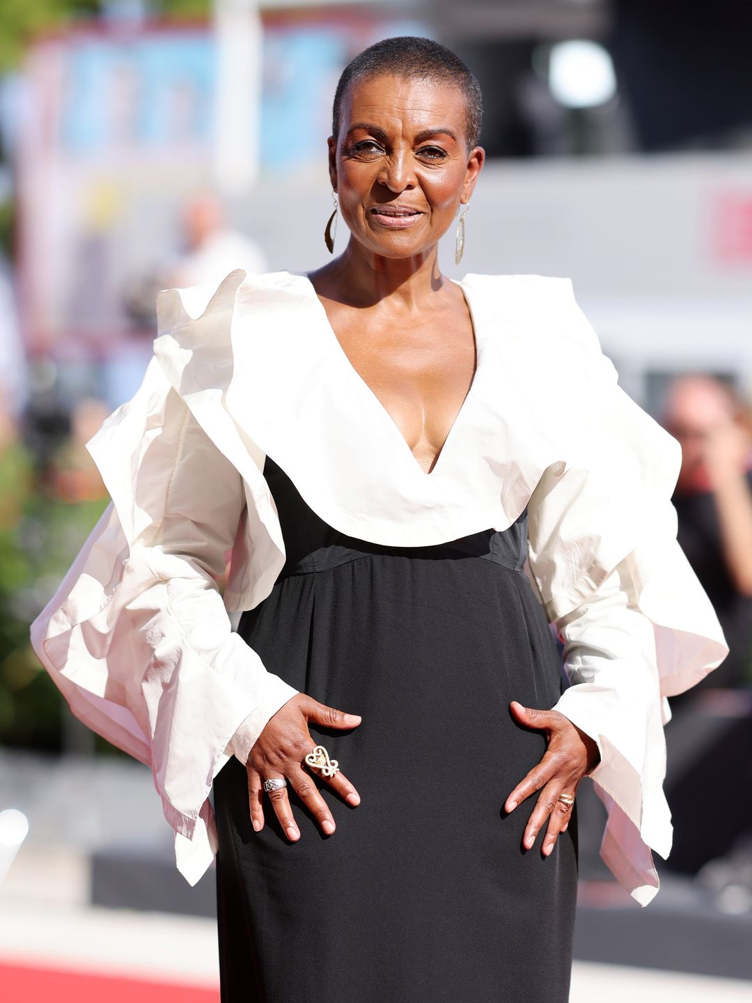 Adjoa Andoh in a white and black dress