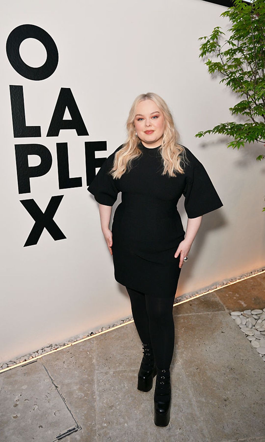  Nicola Coughlan in a litle black dress and tights