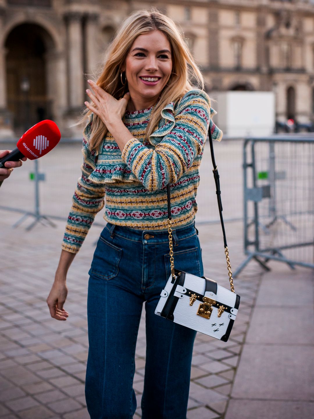 Sienna Miller in a knitted jumper 